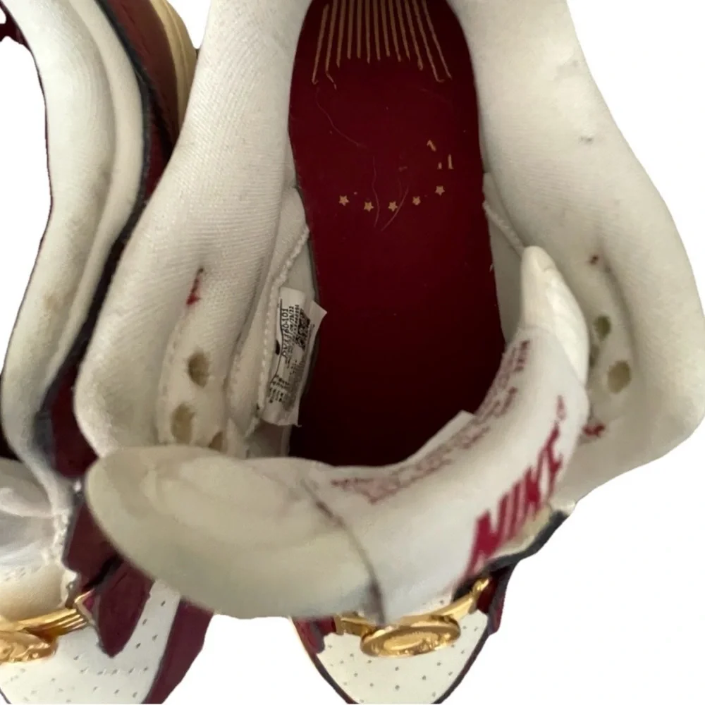 Nike Women’s White and Burgundy Sneakers with Gold Accents